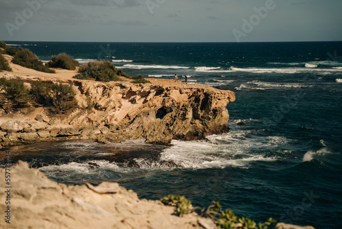 A view of the Pacific Ocean from the cliffs of the Mahaulepu Heritage Trail in Poipu, Kauai, Hawaii, USA photo