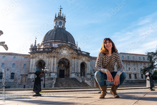 A young woman visiting the Sanctuary of Loyola, Baroque church of Azpeitia, Gipuzkoa, shrine