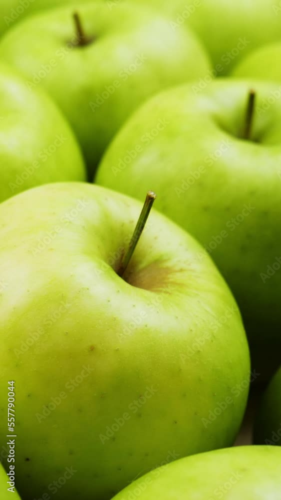 Vertical Screen: Fresh Green Apples in Grocery Store Supermarket Marketplace. Nutritious Vegetarian or Vegan Healthy Food. Organic Fruit. Close up, Content Shot for Social Media Vertical Screen: Fresh Green Apples in Grocery Store Supermarket Marketplace. Nutritious Vegetarian or Vegan Healthy Food. Organic Fruit. Close up, Content Shot for Social Media
