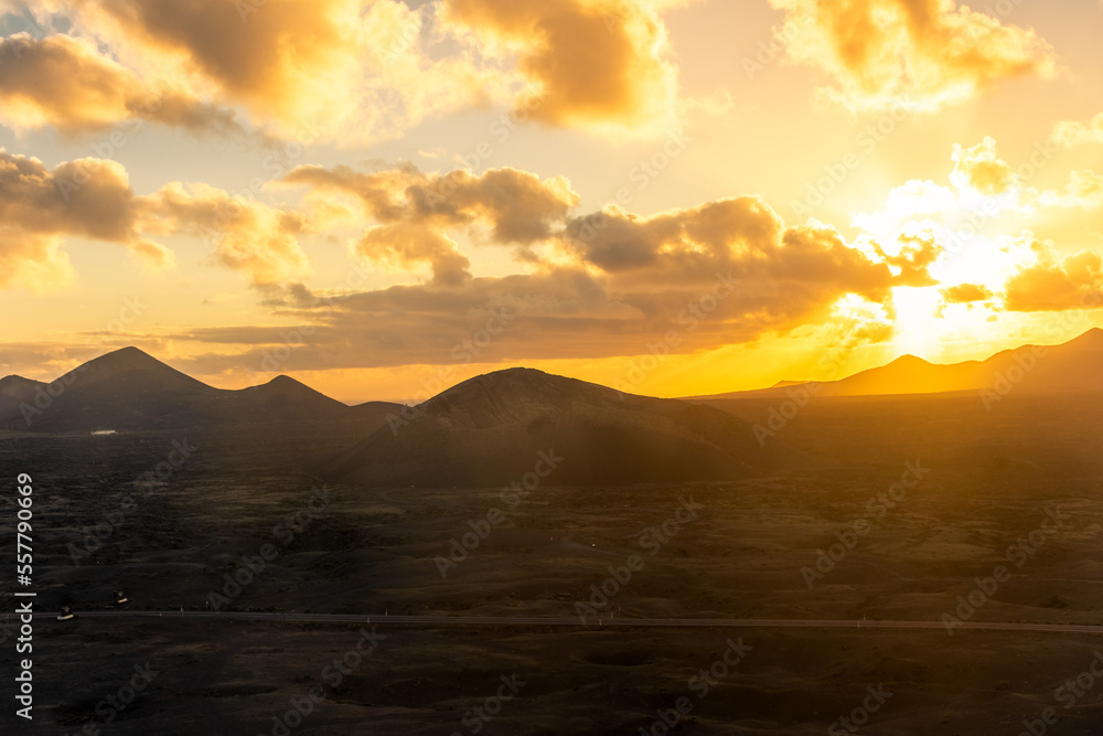 Beautiful sunset over the Volcanos National Park in Lanzarote, Canary Islands,  Spain