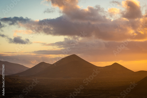 Beautiful silhouette of Lanzarote volcanos at sunset, Canary Islands, Spain