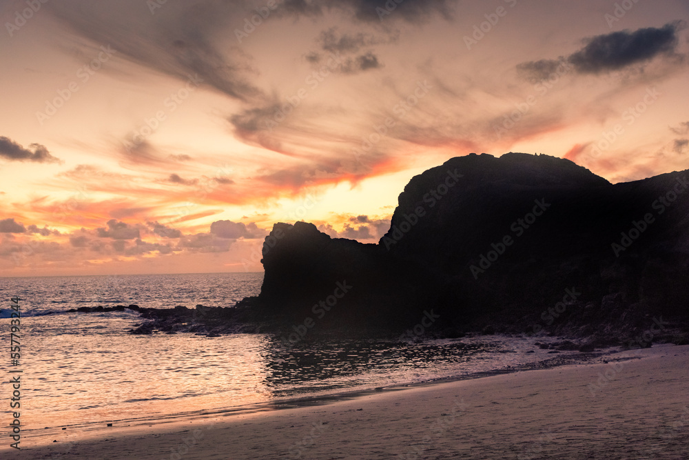 Beautiful sunset over the Atlantic Ocean at Papagayo Beach, Lanzarote,  Canary Islands, Spain