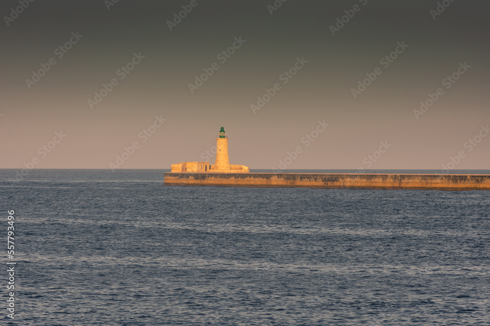 Lighthouse of Valletta at sunset, Malta Lighthouse of Valletta at sunset, Malta