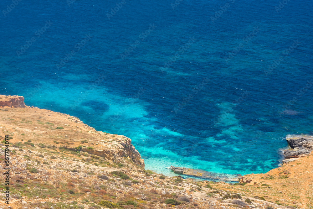 Crystal clear turquoise water down the Dingli Cliffs,  Malta