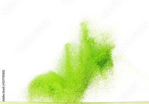 Small size green Sand flying explosion, vegetable sands grain wave explode. Abstract cloud fly. Green colored sand splash throwing in Air. White background Isolated high speed shutter, throwing freeze photo