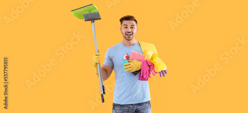 Happy young man with cleani...