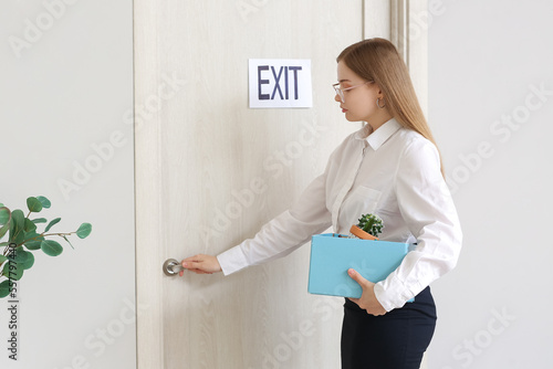 Fired young woman with her ...