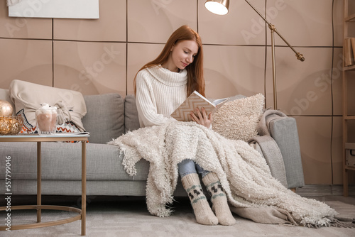 Young redhead woman with pl...