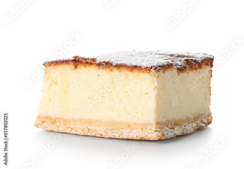Piece of delicious cheese pie with sugar powder on white background