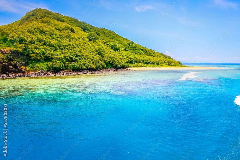Tropical sandy beach at summer day in Fiji Islands, Pacific ocean Tropical sandy beach at summer day in Fiji Islands, Pacific ocean