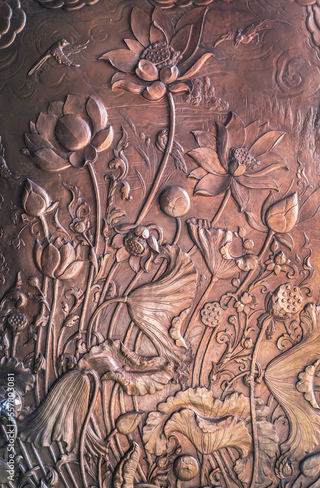 Lotus wood carving on wooden door of Buddhist temple