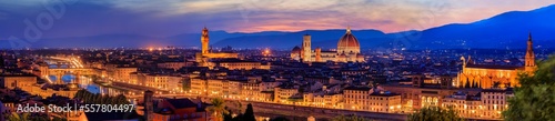 Panorama of Duomo Santa Maria del Fiore cathedral  Bell Tower of Giotto and Palazzo Vecchio Tower in Florence  Italy in a colorful sunset  aerial view
