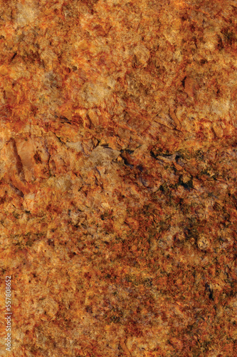 Raw pegmatite feldspar igneous rock terracotta pattern, rusty orange red golden amber yellow vertical background, coarse light crystals  texture, large detailed bright textured minerals macro closeup