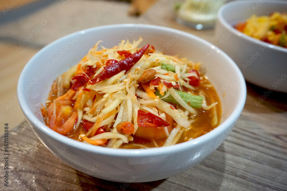 Som Tum Thai Food in White Cup On the Table. Som Tum Thai Food in White Cup On the Table.