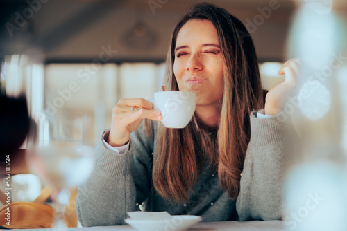 Valokuva Displeased Woman Disliking Coffee for Tasting and Smelling Bad