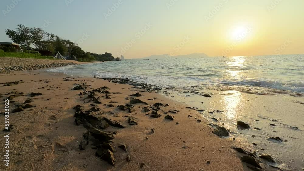 Beach and sea wave at evening, slow motion Beach and sea wave at evening, slow motion
