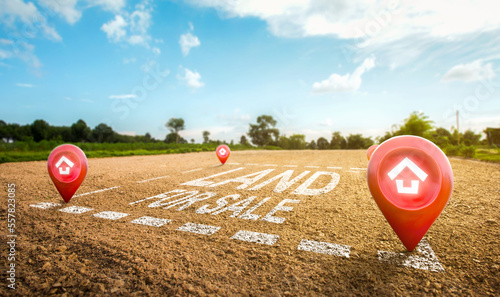 Quadro su tela Land plot management - real estate concept with a vacant land on a green field available for building construction and housing subdivision in a residential area for sale, rent, buy or investment