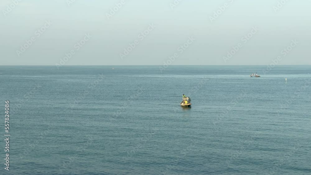 Fishering on seaFisherman is on the sea at morning Fishering on seaFisherman is on the sea at morning