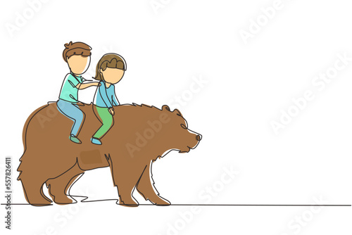Continuous one line drawing happy boy and girl riding brown grizzly bear together. Children sitting on back big bear at circus event. Kids learning to ride beast animal. Single line draw design vector