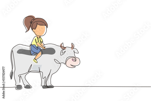 Continuous one line drawing happy little girl riding cow. Cheerful child sitting on back cow with saddle in ranch ground. Kids learning to ride cow. Single line draw design vector graphic illustration