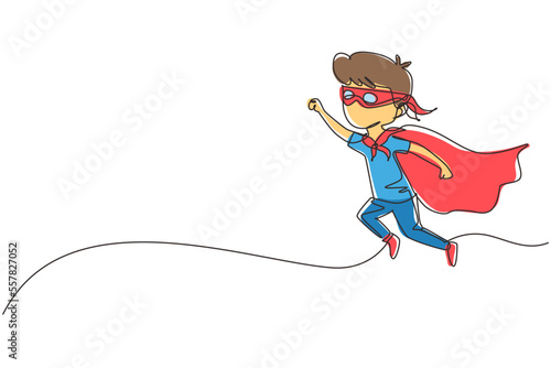 Single continuous line drawing boy flies through air in super hero pose with outstretched hand. Kid in super hero costume with mask on his face and cloak tied around neck. One line draw graphic design