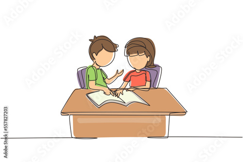 Continuous one line drawing children pupils studying together while boy explains to girl pointing at their notebook. Kids makes homework from school. Single line design vector graphic illustration