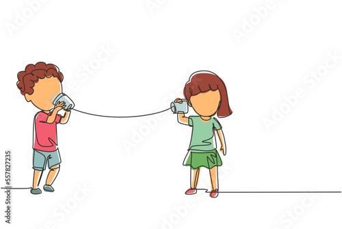 Continuous one line drawing boy and girl play toy phone. Two friends playing in phone with self made speech transmitting device, kids have fun speaking. Single line design vector graphic illustration