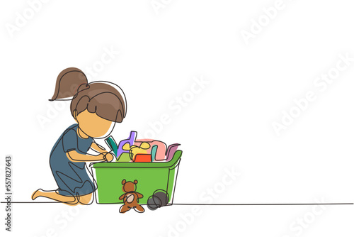 Continuous one line drawing little girl putting her toys into box. Kids doing housework chores at home concept. Smiling child storing her toys in box. Single line design vector graphic illustration