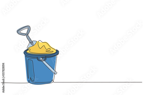 Single one line drawing Bucket and spade. Sand in bucket with shovel. Summer plastic kid toy. Sand bucket and shovel. Children's toys on beach. Continuous line draw design graphic vector illustration