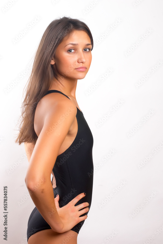 Young pretty woman in gymnastic suit Young pretty woman in gymnastic suit