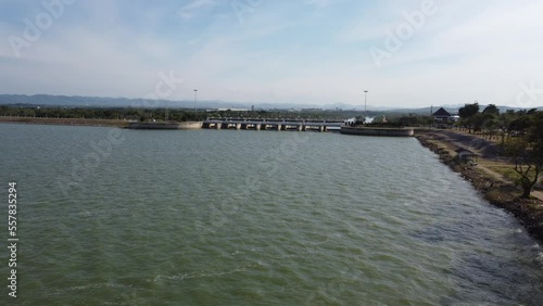 Wallpaper Mural Aerial view of an amazing travel train parked on a floating railway bridge over the water of the lake in Pa Sak Jolasid dam with blue sky at Lopburi, Thailand. Torontodigital.ca
