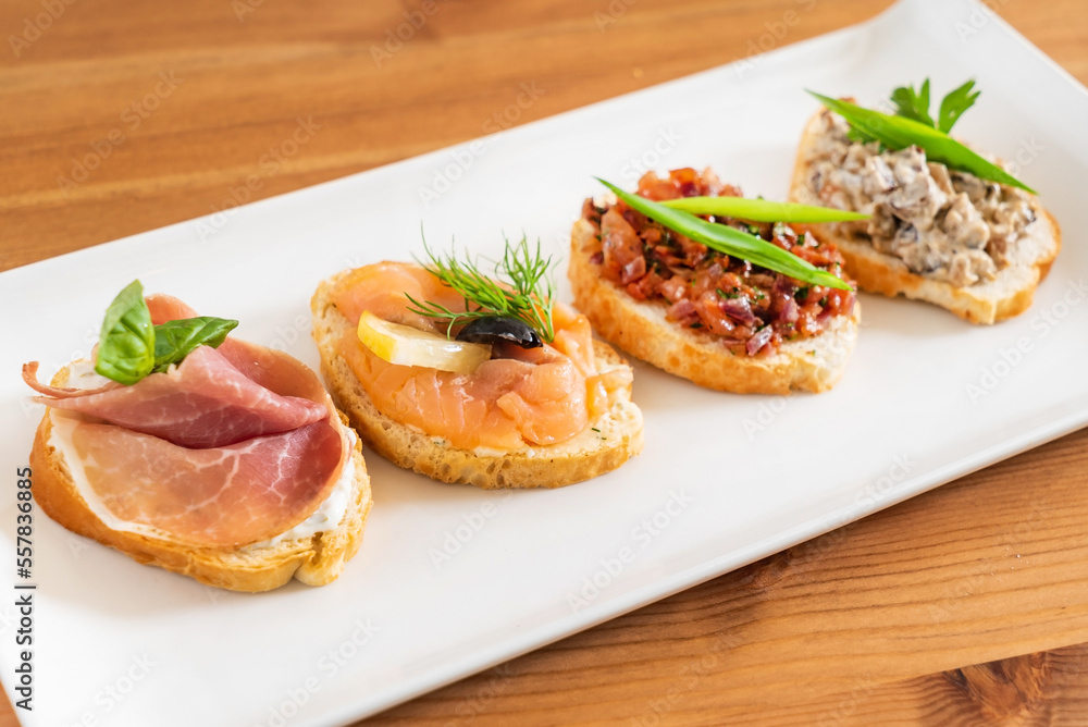 tasty canape on the wooden background