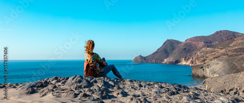 Woman traveling in Andalusia,  Cabo de gata,  near Almeria in Spain photo