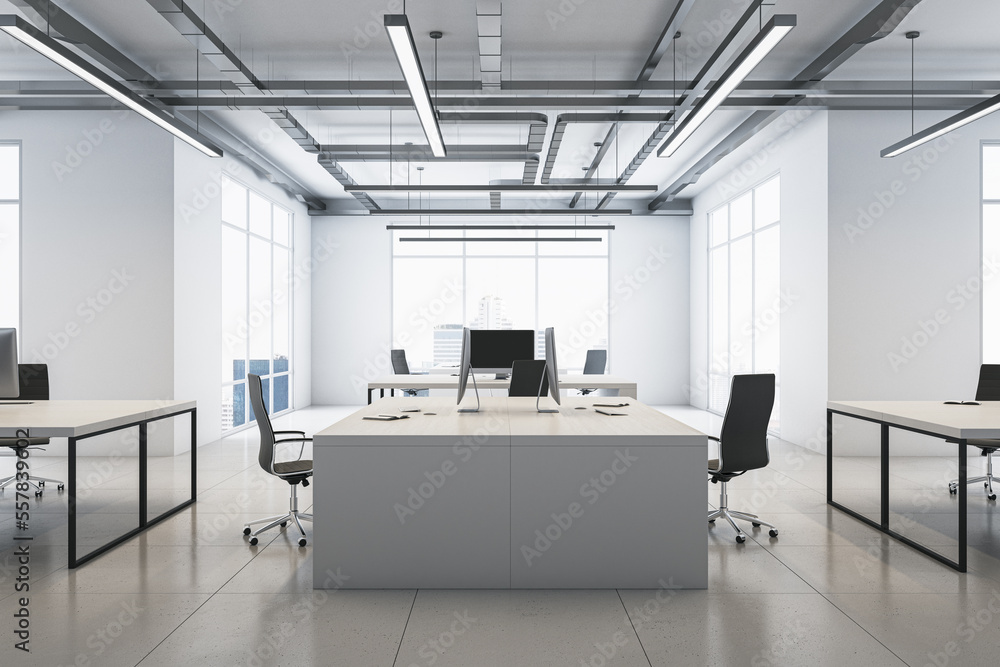 Side view on light huge workspace table with modern computers on light glossy concrete floor in monochrome coworking office with loft style ceiling and white walls background. 3D rendering Side view on light huge workspace table with modern computers on light glossy concrete floor in monochrome coworking office with loft style ceiling and white walls background. 3D rendering