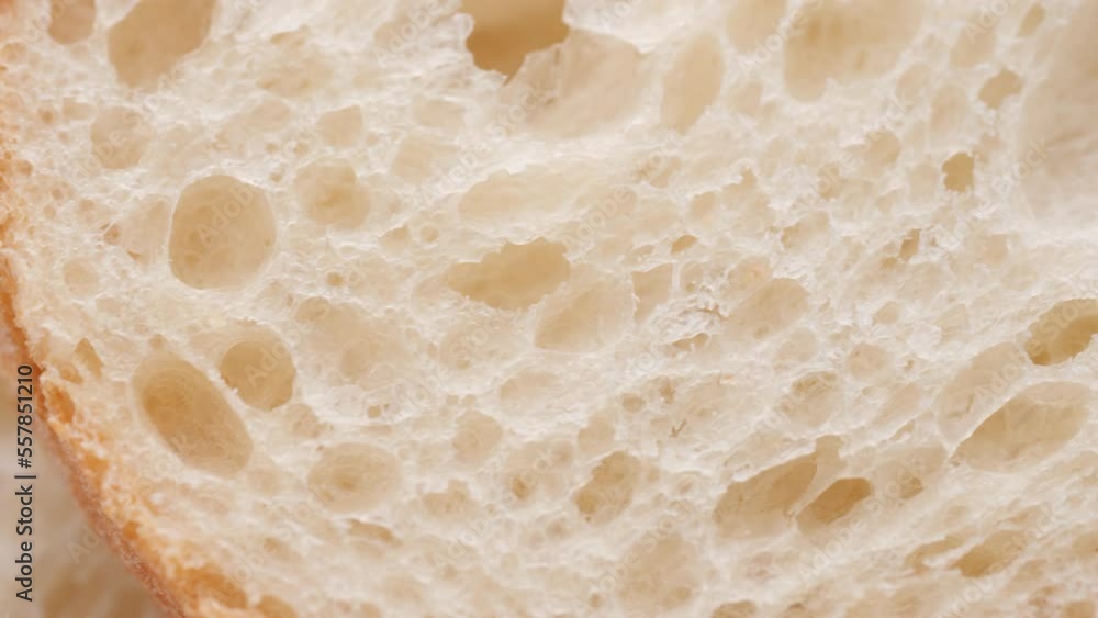 Bread texture extreme macro, slider shot. Texture of baked porous bread close-up Bread texture extreme macro, slider shot. Texture of baked porous bread close-up