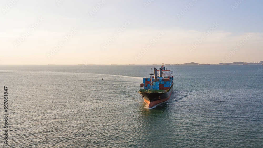 Aerial view container cargo ship, import export commerce global business trade logistic and transportation of worldwide by container cargo ship boat in the open sea, Freight shipping maritime.