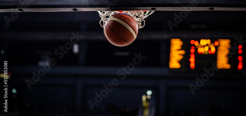 basketball game ball in hoop © Melinda Nagy
