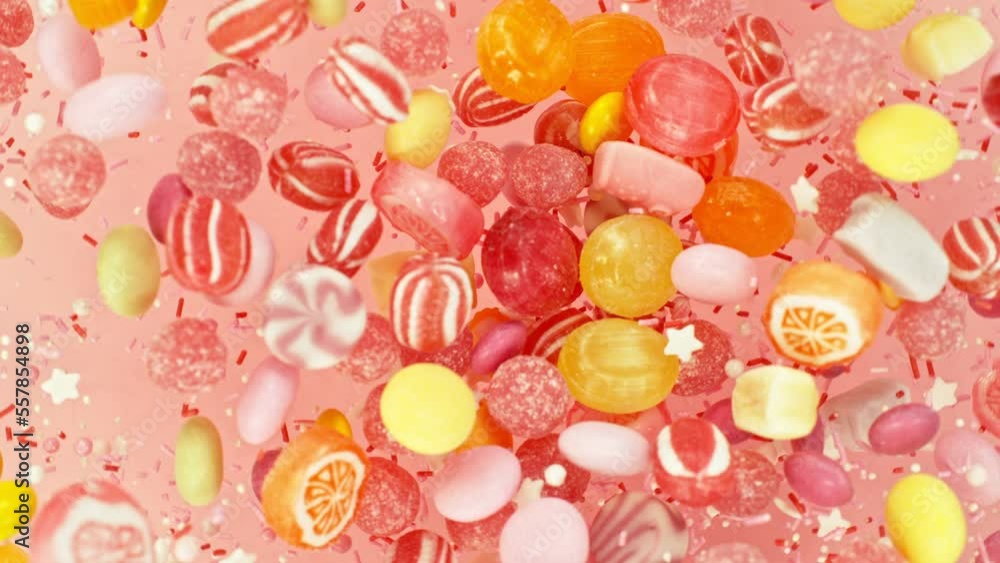 Super slow motion of flying candies up in the air. Camera in super fast motion. Filmed on high speed cinema camera, 1000 fps, placed on high speed cine bot. Super slow motion of flying candies up in the air. Camera in super fast motion. Filmed on high speed cinema camera, 1000 fps, placed on high speed cine bot.