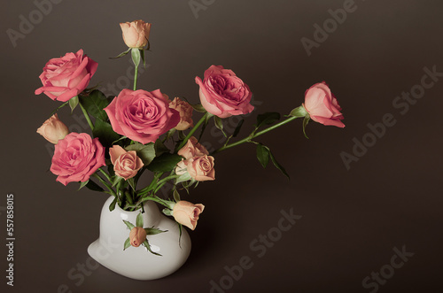 Wallpaper Mural Beautiful bouquet of roses on a brown and gray background for congratulations Torontodigital.ca