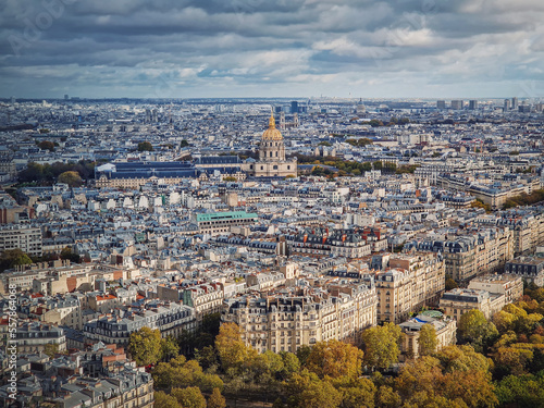 Aerial view of Paris cityscape, France. Les Invalides building with golden dome. Autumn parisian scene