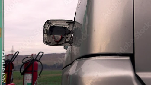 LPG filling of modern SUV car on a gas station