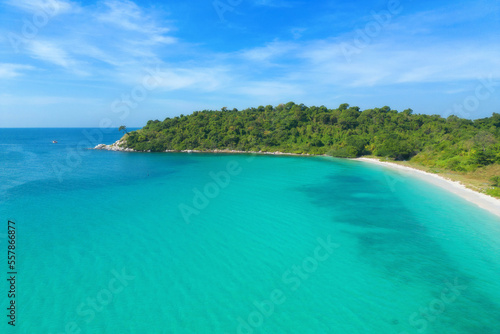 Aerial view of boats with clear blue turquoise seawater, Andaman sea in Phuket island in summer season, Thailand. Water in ocean material pattern texture wallpaper background.