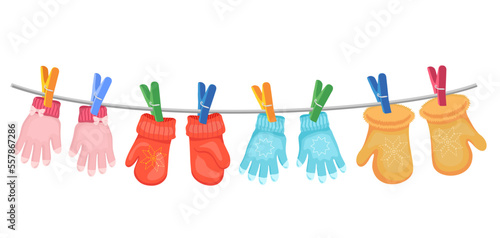 Different mittens hanging on the rope, set, vector illustration. Wool winter glovesmittens dry and hang on laundry string with clothespins. Vector illustration