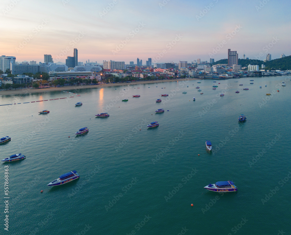 Naklejka premium Aerial view of Pattaya sea, beach in Thailand in summer season, urban city with blue sky for travel background. Chon buri skyline.