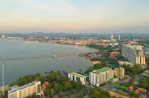 Aerial view of Pattaya sea, beach in Thailand in summer season, urban city with blue sky for travel background. Chon buri skyline.