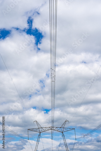 Wallpaper Mural High voltage power line pylon on blue cloudy sky Torontodigital.ca