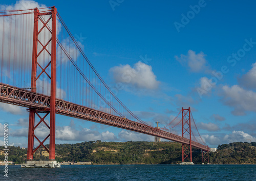 The "25 de Abril" suspension bridge (which translates to the "25th of April" Bridge) and the 'Cristo Rei' (which translates to "Christ the King")  statue on the banks of the Tagus River in the capital © Paul Jackson