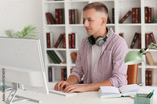 Young man with headphones a...