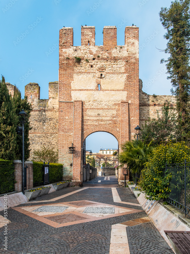 Gate of Lion of Saint Mark and tower of the walled town of Lazise on Garda Lake, Province of Verona, Venetor region, northern Italy