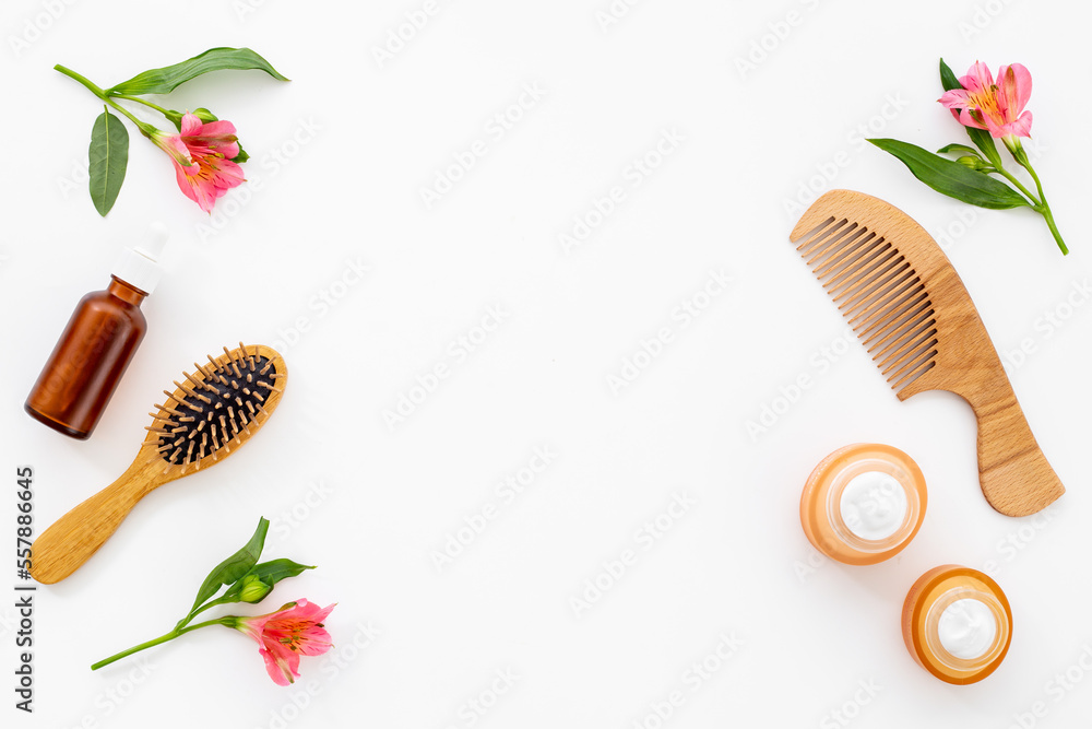 Set of hair care and styling products with flowers Set of hair care and styling products with flowers